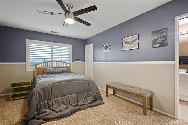 23501 Brigin Pl, Murrieta, CA 92562 - bedroom featuring carpet floors, baseboards, ceiling fan, and connected bathroom