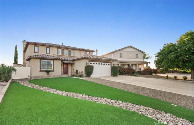 23501 Brigin Pl, Murrieta, CA 92562 - view of front facade with a chimney, concrete driveway, stucco siding, an attached garage, and a tiled roof