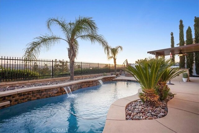 23501 Brigin Pl, Murrieta, CA 92562 - view of swimming pool with a fenced backyard and a ceiling fan