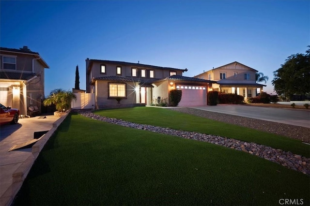 23501 Brigin Pl, Murrieta, CA 92562 - view of front of home with concrete driveway, a garage, a front yard, and stucco siding