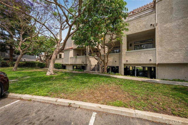 17202 Corbina Ln Unit 206, Huntington Beach, CA 92649 - view of building exterior with uncovered parking
