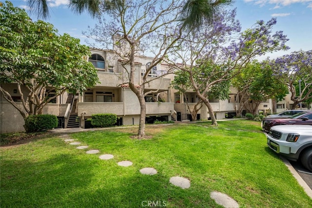 17202 Corbina Ln Unit 206, Huntington Beach, CA 92649 - view of home's community with a lawn and stairs