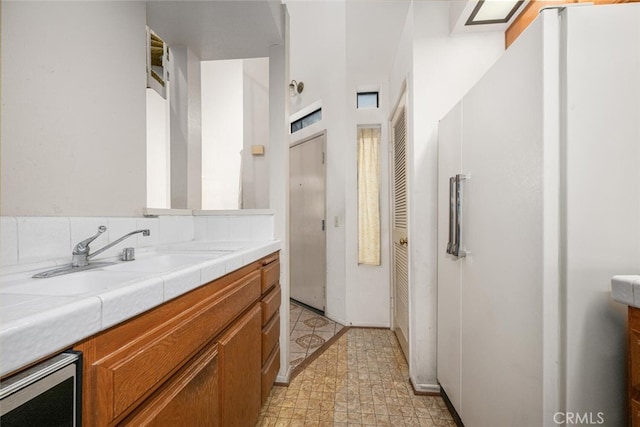17202 Corbina Ln Unit 206, Huntington Beach, CA 92649 - full bath with vanity and wine cooler