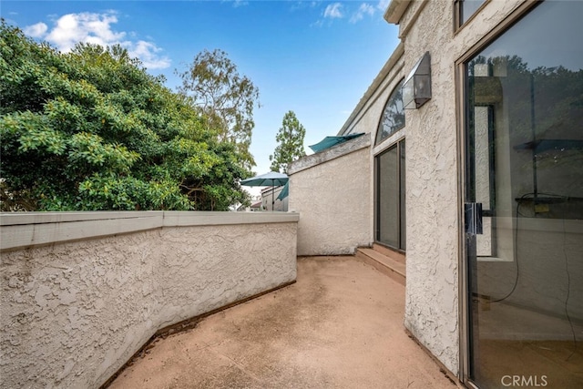 17202 Corbina Ln Unit 206, Huntington Beach, CA 92649 - view of patio with a balcony