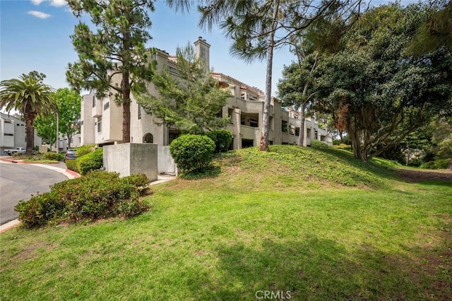 17202 Corbina Ln Unit 206, Huntington Beach, CA 92649 - view of grassy yard