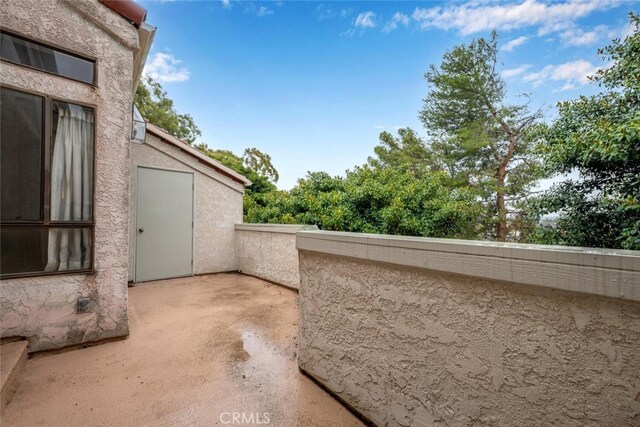 17202 Corbina Ln Unit 206, Huntington Beach, CA 92649 - view of patio with a balcony
