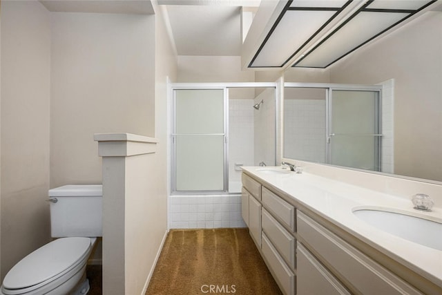 17202 Corbina Ln Unit 206, Huntington Beach, CA 92649 - bathroom featuring toilet, double vanity, and baseboards