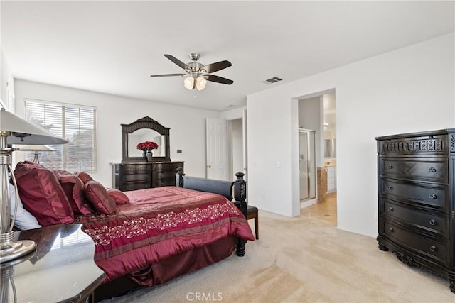 35358 Perla Pl, Wildomar, CA 92595 - bedroom with light colored carpet, a ceiling fan, and ensuite bath