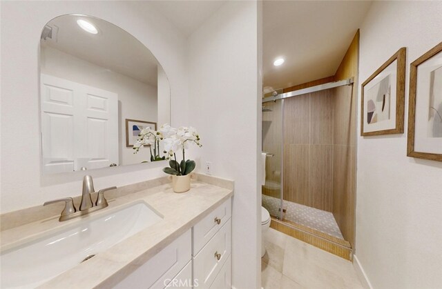 4263 E Ranch Gate Rd, Anaheim Hills, CA 92807 - bathroom with toilet, vanity, a stall shower, tile patterned floors, and recessed lighting