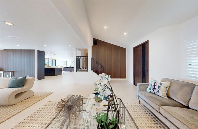 4263 E Ranch Gate Rd, Anaheim Hills, CA 92807 - living room with vaulted ceiling, stairway, recessed lighting, and wood walls