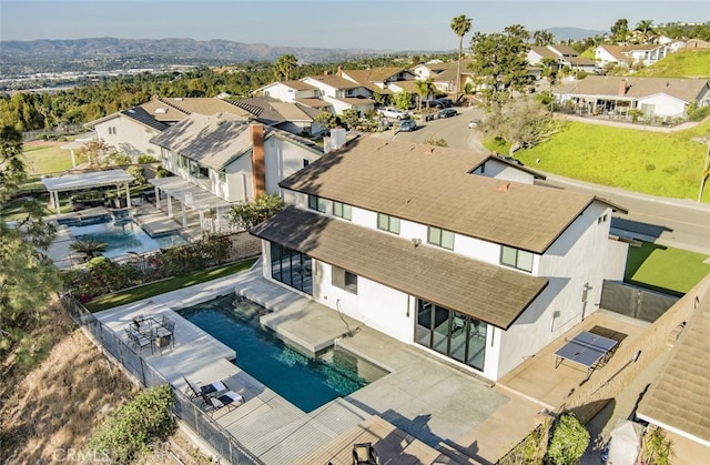 4263 E Ranch Gate Rd, Anaheim Hills, CA 92807 - aerial perspective of suburban area featuring a pool