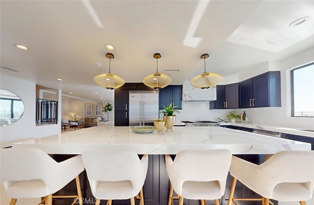 4263 E Ranch Gate Rd, Anaheim Hills, CA 92807 - kitchen featuring stainless steel built in fridge, recessed lighting, light stone counters, decorative light fixtures, and a spacious island