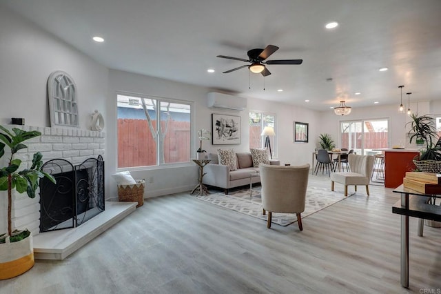 1320 Vinca Way, San Diego, CA 92114 - living room with a wall unit AC, light wood-type flooring, recessed lighting, healthy amount of natural light, and a ceiling fan
