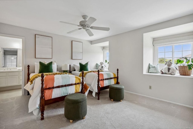 3686 Landfair Ct, San Diego, CA 92130 - bedroom with multiple windows, light colored carpet, baseboards, and ensuite bath
