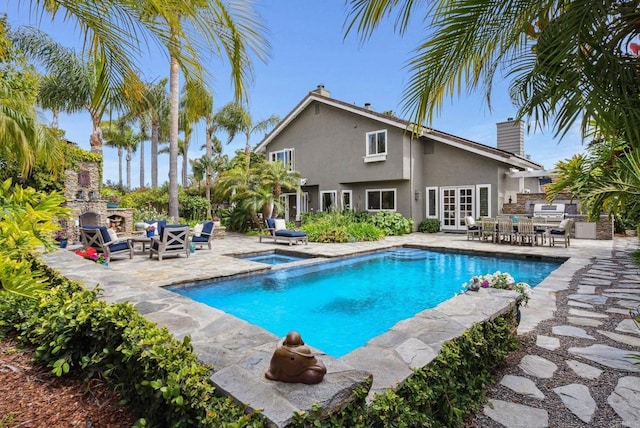 3686 Landfair Ct, San Diego, CA 92130 - outdoor pool with a patio area, an in-ground hot tub, french doors, and exterior kitchen