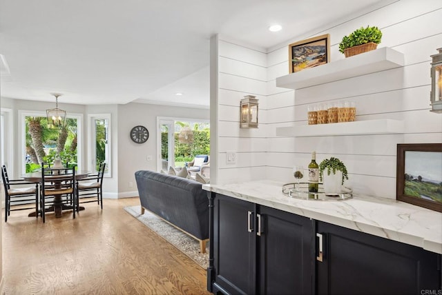 3686 Landfair Ct, San Diego, CA 92130 - indoor bar with light wood-style floors, recessed lighting, baseboards, pendant lighting, and ornamental molding