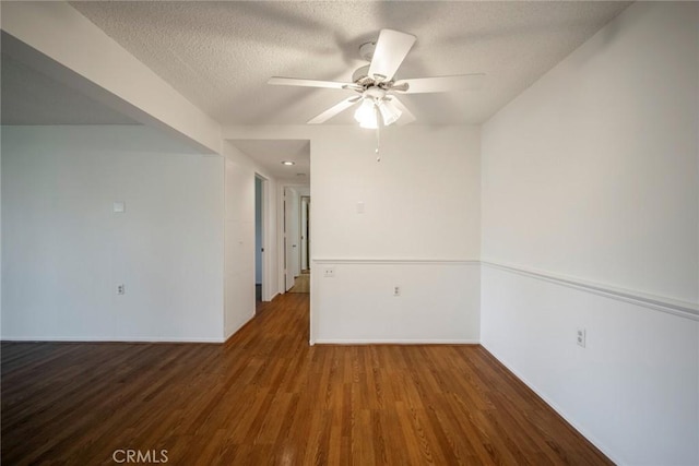 270 Avenida Sevilla Unit C, Laguna Woods, CA 92637 - unfurnished room with a ceiling fan, wood finished floors, a textured ceiling, and baseboards