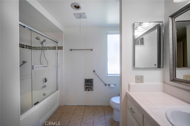 270 Avenida Sevilla Unit C, Laguna Woods, CA 92637 - bathroom featuring plenty of natural light, vanity, toilet, and enclosed tub / shower combo
