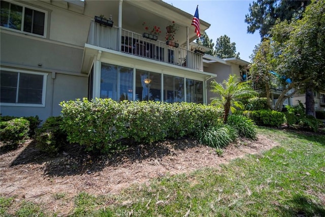 270 Avenida Sevilla Unit C, Laguna Woods, CA 92637 - view of property exterior with stucco siding and a balcony