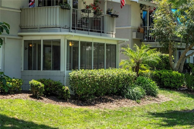 270 Avenida Sevilla Unit C, Laguna Woods, CA 92637 - rear view of house with a balcony and a yard