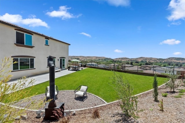 11653 Couples Ct, Beaumont, CA 92223 - view of yard featuring a mountain view and a patio
