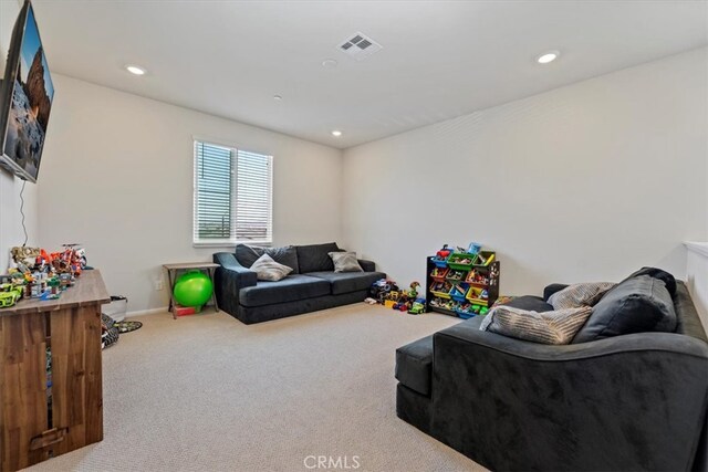 11653 Couples Ct, Beaumont, CA 92223 - living room featuring carpet flooring, recessed lighting, and baseboards