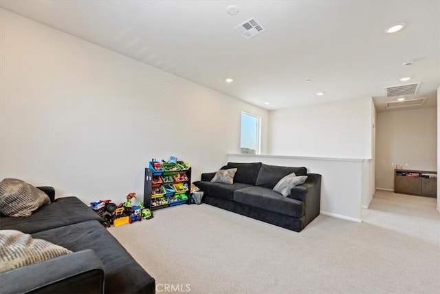 11653 Couples Ct, Beaumont, CA 92223 - living area with light carpet, recessed lighting, and baseboards