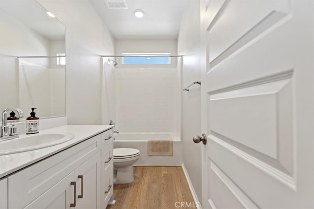 11653 Couples Ct, Beaumont, CA 92223 - full bath featuring toilet, washtub / shower combination, wood finished floors, and vanity