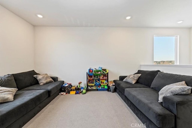11653 Couples Ct, Beaumont, CA 92223 - carpeted living area featuring recessed lighting