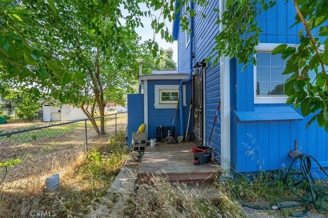 818 6th St, Corning, CA 96021 - view of property exterior featuring a wooden deck