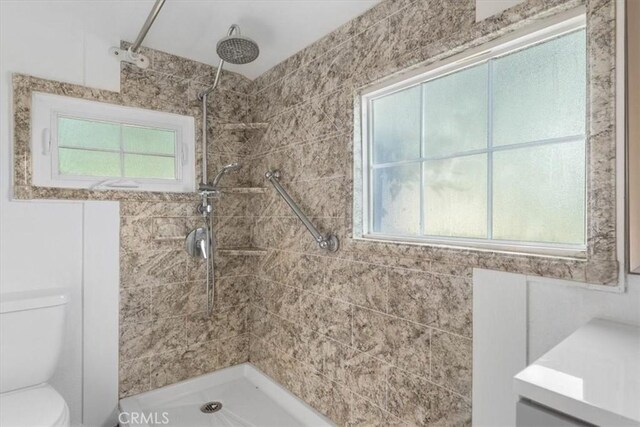 818 6th St, Corning, CA 96021 - bathroom featuring toilet and tiled shower
