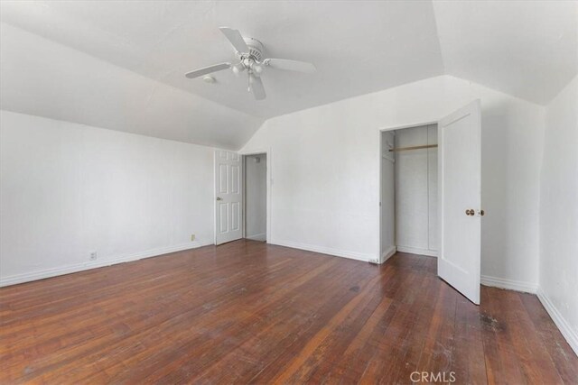 818 6th St, Corning, CA 96021 - unfurnished bedroom featuring lofted ceiling, hardwood / wood-style flooring, and a ceiling fan