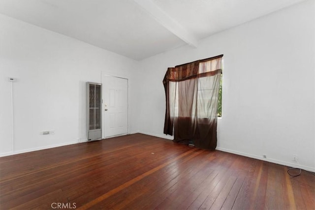818 6th St, Corning, CA 96021 - spare room with hardwood / wood-style floors and beam ceiling