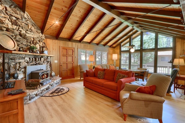 8067 Chilnualna Falls Rd, Wawona, CA 95389 - living room featuring wooden ceiling with exposed beams, wood finished floors, wood walls, and high vaulted ceiling