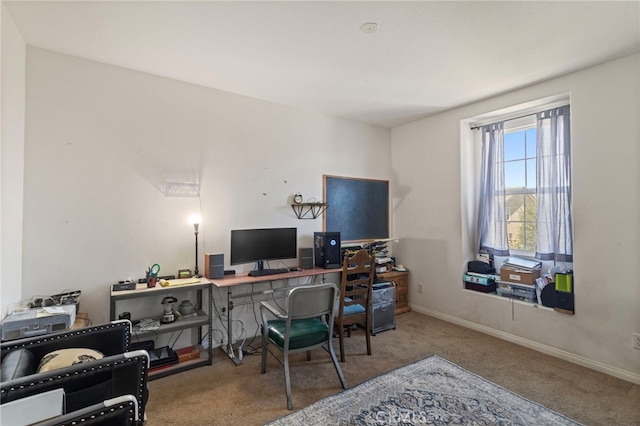 3042 San Luis Dr, Lancaster, CA 93535 - office area with carpet flooring and baseboards