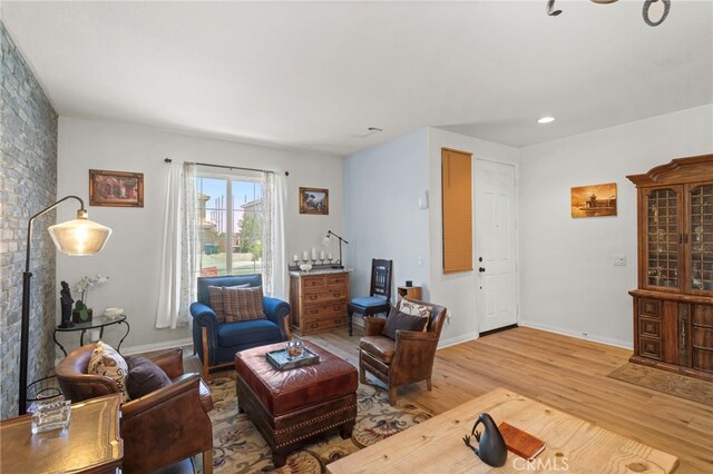 3042 San Luis Dr, Lancaster, CA 93535 - living area with light wood-type flooring and baseboards