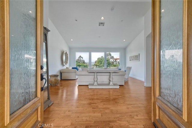 1177 Estee Ct, Fallbrook, CA 92028 - entrance foyer featuring lofted ceiling, light wood-style flooring, and recessed lighting