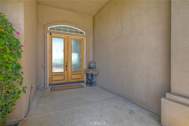 1177 Estee Ct, Fallbrook, CA 92028 - property entrance featuring french doors and stucco siding