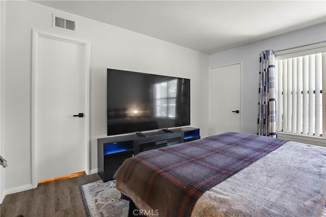 10655 Lemon Ave Unit 2402, Rancho Cucamonga, CA 91737 - bedroom featuring wood finished floors and baseboards