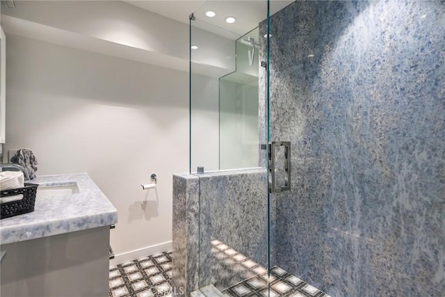 1585 S Coast Unit 2, Laguna Beach, CA 92651 - bathroom with a walk in shower, vanity, baseboards, recessed lighting, and tile patterned floors