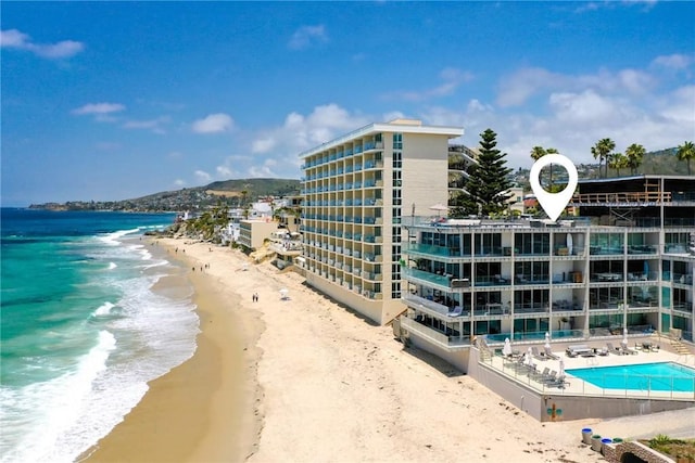 1585 S Coast Unit 2, Laguna Beach, CA 92651 - view of apartment building / complex with view of water and beach and a community pool