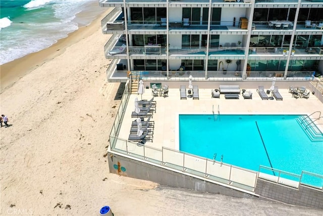 1585 S Coast Unit 2, Laguna Beach, CA 92651 - aerial view of a pool, expansive coastline, and apartment complex
