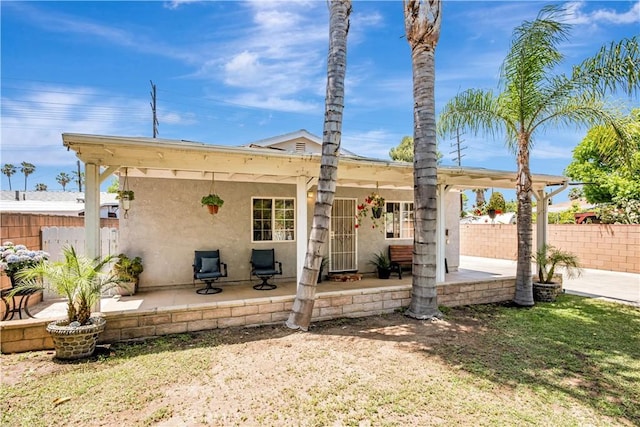 8960 Telfair Ave, Sun Valley, CA 91352 - view of front facade featuring stucco siding and a patio area
