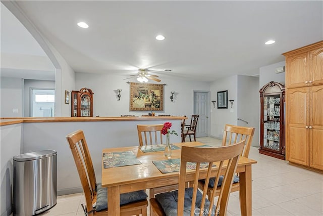 8960 Telfair Ave, Sun Valley, CA 91352 - dining area with light tile patterned floors, recessed lighting, ceiling fan, and arched walkways