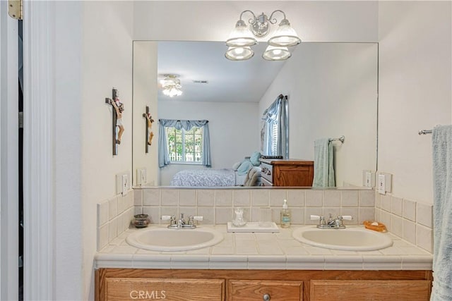 8960 Telfair Ave, Sun Valley, CA 91352 - full bath featuring ensuite bath, double vanity, and a chandelier