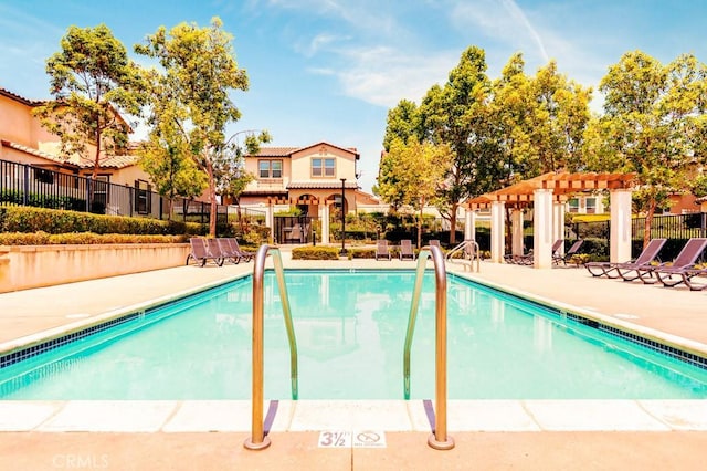 5764 Alcala Way, Riverside, CA 92505 - community pool with a pergola and a patio area