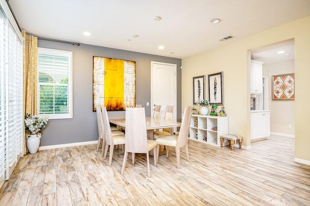 5764 Alcala Way, Riverside, CA 92505 - dining space with light wood finished floors, recessed lighting, and baseboards