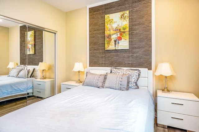 5764 Alcala Way, Riverside, CA 92505 - bedroom with wood finished floors and a closet