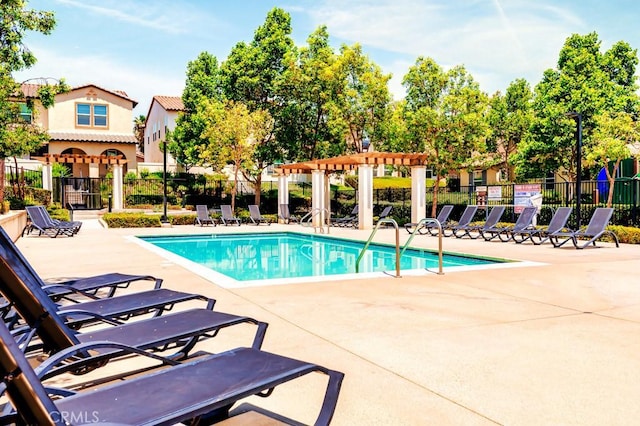 5764 Alcala Way, Riverside, CA 92505 - community pool with a patio area and a pergola