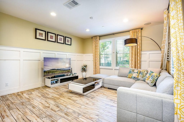 5764 Alcala Way, Riverside, CA 92505 - living room with a decorative wall, wainscoting, light wood-type flooring, and recessed lighting